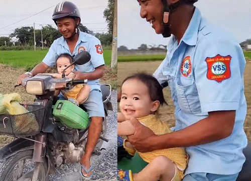 Dễ thương cô con gái nhỏ chạy lon ton đón ba đi làm về, nụ cười hạnh phúc khi được ngồi trên con xe cũ mèm của ba