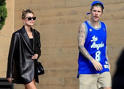 Justin Bieber mặc bộ đồ thể thao, lộ vẻ mặt tức giận khi đi ăn cùng vợ
