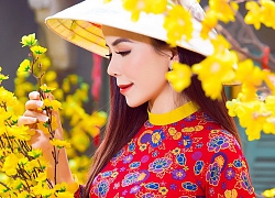 Oanh Lê khoe dáng với áo dài sau khi đăng quang Mrs International World 2019