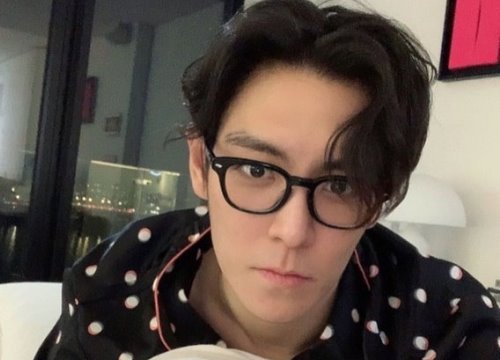 Fan lo lắng trước loạt hành động khó hiểu của T.O.P (Big Bang)