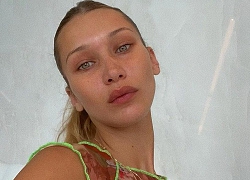 Bella Hadid mặc hở, để mặt mộc xuống phố