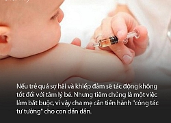 Em bé đi tiêm nhìn cô y tá với ánh mắt "hình viên đạn" khiến ai nấy bật cười vì quá đáng yêu