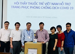 Hỗ trợ cán bộ y tế trang phục phòng hộ chống dịch Covid-19