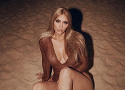 Kim Kardashian khoe tóc lưới cá sau khi bị tố photoshop