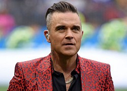 Robbie Williams từng bị cướp dọa chặt đầu