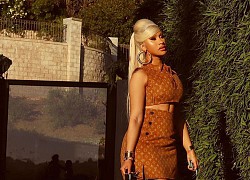 Thợ may bí mật đứng đằng sau trang phục của Chris Brown, Cardi B