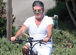 Simon Cowell tập đi sau khi bị ngã gãy lưng