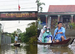 Nhiều nơi ở Huế ngập trong nước lũ, dân đi lại bằng thuyền