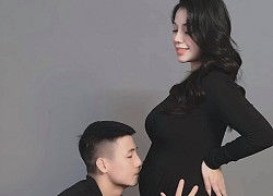 Bùi Tiến Dũng hôn bụng bầu của vợ