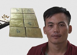 Bắt đối tượng mang súng vận chuyển 8 bánh heroin