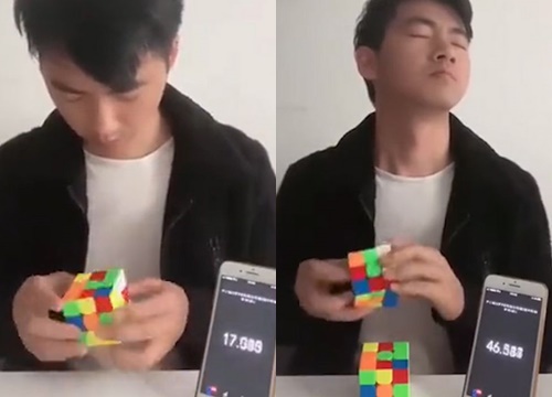 Chàng trai nhắm mắt biểu diễn xoay 2 khối rubik giống nhau