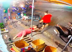 Người phụ nữ bán hoa quả bị túm tóc, kéo lê ra đường, camera tố hành vi dã man của nhóm côn đồ