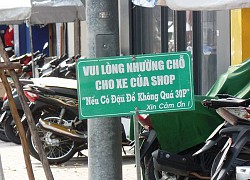 Tranh cãi chuyện chủ nhà đặt vật cản dưới lòng đường để ô tô khỏi dừng đỗ