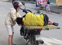 Xôn xao hình ảnh chồng nhậu say bí tỉ, vợ đến tận nơi cột lại chở về, nhìn không khác gì... chở heo?