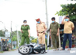 Nam thanh niên lăn cục bêtông ra đường khiến cô gái đi xe máy ngã chấn thương sọ não