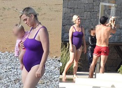 Katy Perry mặc bikini màu tím ôm con gái, lộ bụng bầu khi đi nghỉ với Orlando Bloom