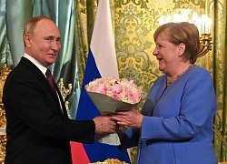 Putin gặp Merkel