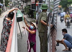 Tháo dỡ hàng rào tôn &#8216;phòng dịch&#8217; ngăn đôi đường