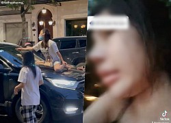 NÓNG: Vợ ngồi trên nắp capo bắt ghen chồng và "tiểu tam" cố thủ trong ô tô "nhún nhảy" giữa phố, la hét đến khàn cả tiếng