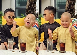 Cả vũ trụ cute trong khung ảnh diện áo dài của nhóc tỳ nhà Trà My: Cậu cả ngầu như soái ca, quay sang bé út mà cười xỉu!