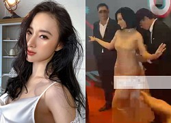 Angela Phương Trinh được 4 vệ sĩ hộ tống đến sự kiện, chơi lớn "cởi đồ" trước mặt mọi người