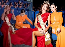 Vũ Thu Phương khom người chỉnh váy cho Miss Global 2022 giữa sự kiện