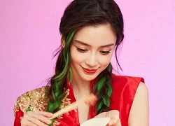 Angelababy không bóc bao lì xì của con