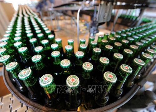 Hãng bia Heineken rút khỏi thị trường Nga