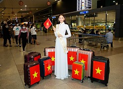 Đoàn Hồng Trang diện áo dài trắng tinh khôi lên đường dự thi Miss Global 2022