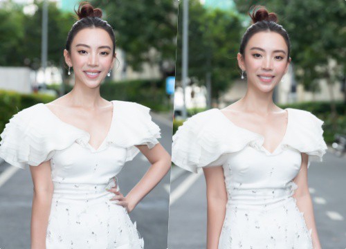 Thu Trang diện váy trắng đơn giản, trẻ đẹp khi làm bà chủ