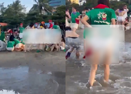 2 cô gái trong nhóm du khách lột áo ngực phản cảm ngay giữa bãi biển Cửa Lò - Netizen - Việt Giải Trí