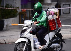 Bộ Công thương yêu cầu Grab làm rõ việc thu phụ phí 'nắng nóng', 'kẹt xe'