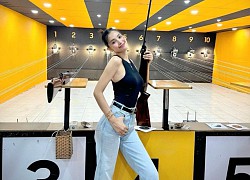 Tiểu Vy ấn tượng với hình ảnh đi bắn súng, diện áo ôm body