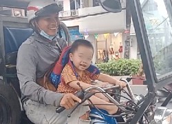 Cảm động cha khiếm khuyết đón con tan học: "Mạnh mẽ giống cha con nhé"