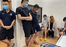 Cảnh tượng đáng xấu hổ trong phòng massage có 5 nam và 2 nữ