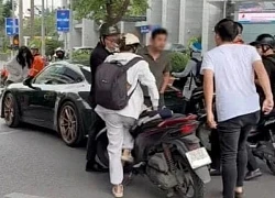 Hà Nội: Sau va chạm giao thông, tài xế ô tô Porsche và lái xe máy đánh nhau