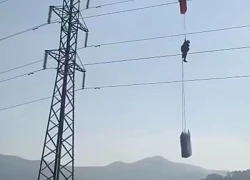 Người đàn ông nhảy dù mắc kẹt trên đường điện cao thế 110kV