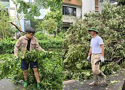 NSND Xuân Bắc cùng 2 con trai hỗ trợ dọn cây đổ trên phố sau bão Yagi