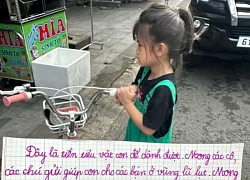 Bé gái lớp 2 mang xấp tiền lẻ ủng hộ vùng bão lũ cùng lời nhắn cảm động