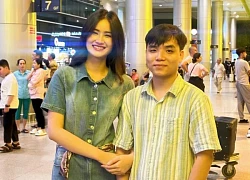 Hoa hậu Ý Nhi về nước, rạng rỡ khoác tay bạn trai ở sân bay