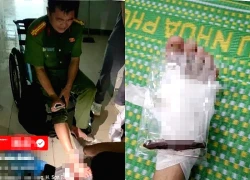 Bị thanh gỗ đâm xuyên chân, trưởng công an xã nén đau giúp dân giữa mưa lũ