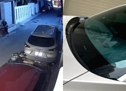 Camera ghi lại cảnh kẻ gian xăm trổ tháo trộm cần gạt nước ô tô ở Hà Nội