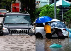 Ôtô chết máy la liệt giữa 'biển ngập' ở Hà Nội