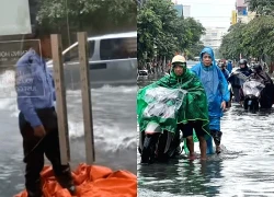 Bảo vệ ngã nhào khi ôtô lao qua vùng ngập sâu ở Hải Phòng