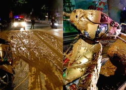 Công an truy tìm ô tô làm đổ bùn nhão ra đường ở Hà Nội