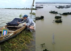 Con gái đau đớn bên xuồng chở thi thể cha, chờ quan tài giữa biển lũ Hòa Xuân