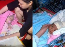 Thương lắm những em bé giữa dòng nước lũ: Có bé còn "đỏ hỏn" đã phải chạy lũ, tiếng khóc nghe thôi đã "xé lòng"