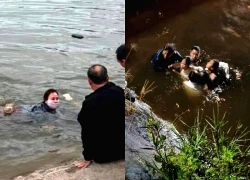 Hai cha con dũng cảm lao xuống dòng nước cứu 3 người trong đêm mưa rét