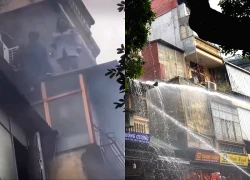 Clip: Khoảnh khắc người phụ nữ trượt chân rơi xuống đất khi thoát khỏi đám cháy trên phố Hàng Mã khiến ai cũng thót tim