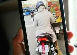 Xử phạt hai phụ nữ dán "bùa" che biển số xe máy ở TPHCM